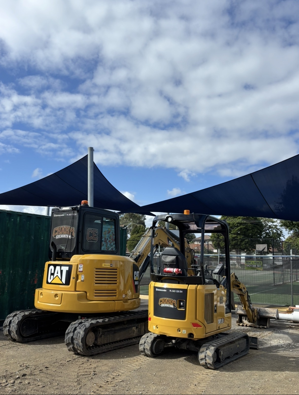 Charm Excavation branded fleet on site